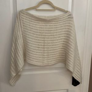 Woman’s off white poncho